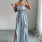 👗💙 Geometrischer Jumpsuit mit Halter-Ausschnitt & Seitenschlitz!