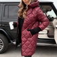 Manteau long matelassé en duvet avec capuche pour femmes 