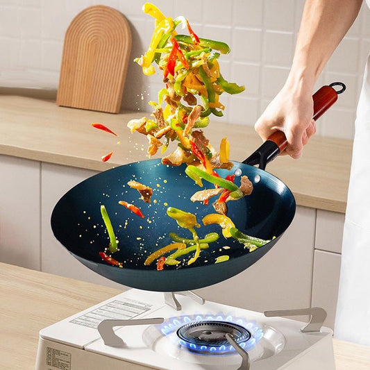 Praktisk present - non-stick järnwok för hemmabruk, för omrörning och stekning