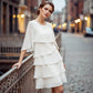 Mehrlagiges Rüschenkleid mit Rundhalsausschnitt