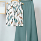 Sommerliche Eleganz: Zweiteiliges Print-Set mit fließender weiter Hose