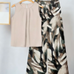 Sommerliche Eleganz: Zweiteiliges Print-Set mit fließender weiter Hose