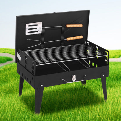 Tragbarer, faltbarer Holzkohlegrill für das Kochen im Freien